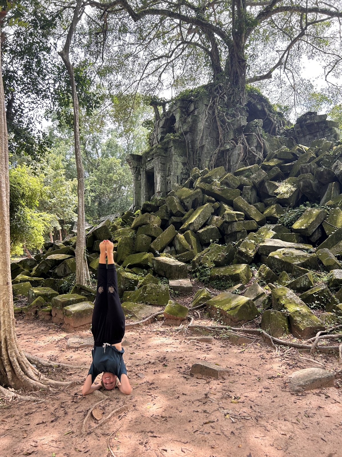 Headstand at temple ruins